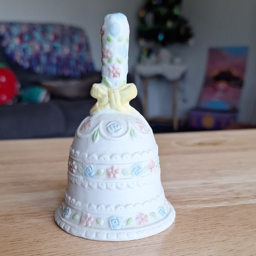 Floral Ceramic Bell with Yellow Bow